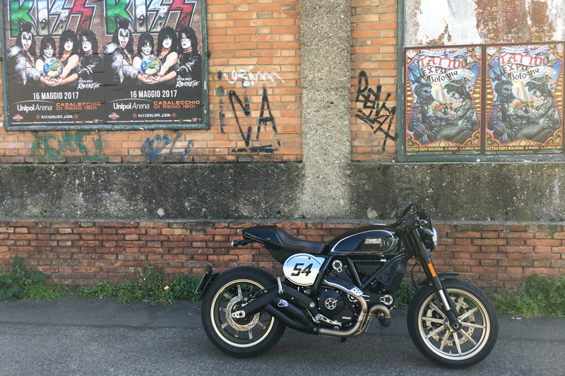 The "Black Coffee" and gold color scheme is a throwback to the 900 Super Sport of the 1970s, while the "54" number plate is a tribute to famous Ducati racer Bruno Spaggiari.