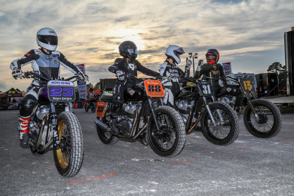 Build Train Race ladies aboard their Royal Enfields ready to race at the Daytona Short Track