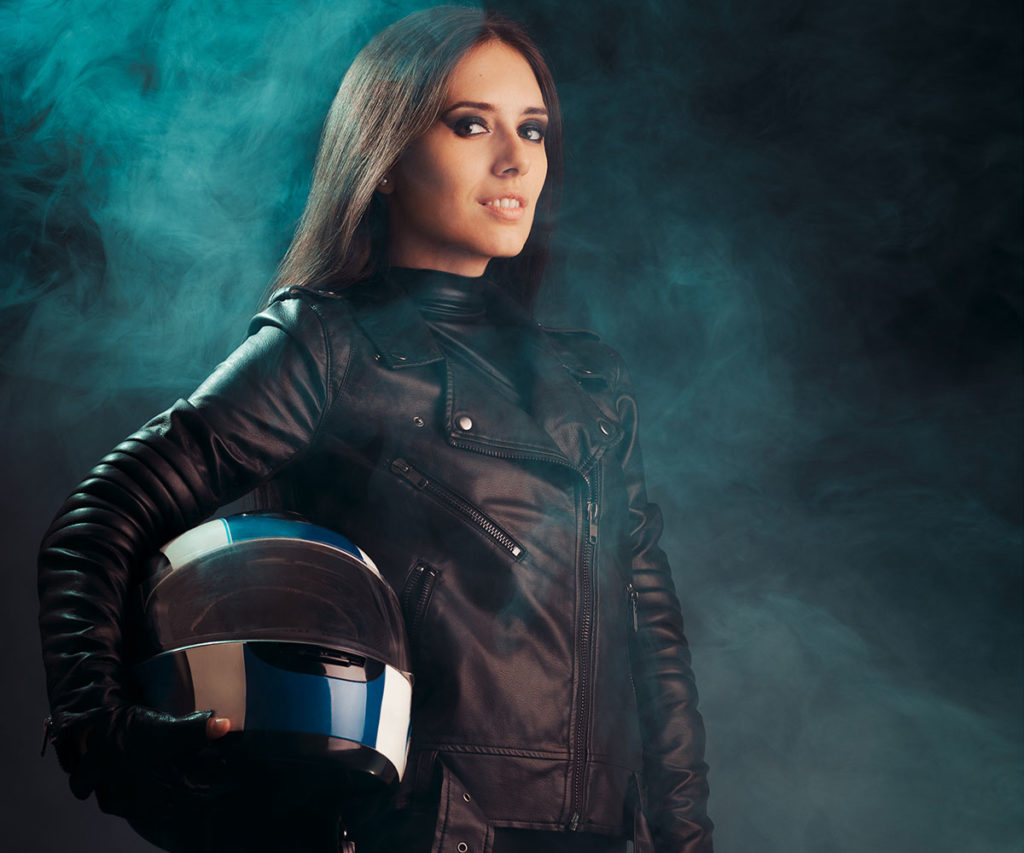 Biker Woman with Helmet and Leather Outfit Portrait